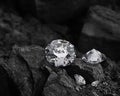 diamond on black coal background Royalty Free Stock Photo