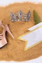 Diamond Crown, High heel shoes, Sash for Princess Miss Pageant Beauty Contest on Sand Beach in Tropical Island beautiful summer Royalty Free Stock Photo