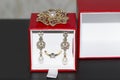 Diamond earrings and brooch with pearls