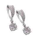 Diamond earrings on white Royalty Free Stock Photo