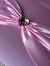 Diamond heart on pink ribbon Royalty Free Stock Photo