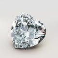 Diamond heart shape. Beautiful shape emerald image with reflective surface. Render brilliant jewelry stock image. Royalty Free Stock Photo