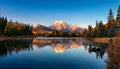 Diamond Lake in autumn with reflection of Rundle Mountain at sunrise Royalty Free Stock Photo