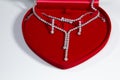 Diamond necklace set diamond earrings diamond bracelet Heart shaped red box Royalty Free Stock Photo