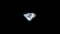 Diamond with reflection isolated on black background. Shiny diamond rotating on a dark background. Crystal stone and