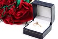 Diamond ring and bouquet paper red roses