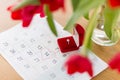 Diamond ring and calendar sheet on valentines day