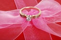 Diamond ring on pink bow Royalty Free Stock Photo