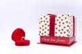 Diamond ring in the red heart box with gift box isolated on whit Royalty Free Stock Photo