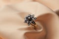 Diamond ring in shape of flower leaves, close-up Royalty Free Stock Photo