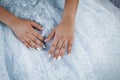 Diamond Ring on top of blue dress