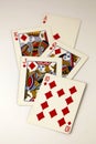 Diamond royal flush poker hand in red