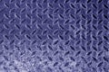 Diamond shaped metal floor pattern in blue tone. Royalty Free Stock Photo