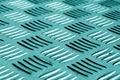 Diamond shaped metal floor pattern with blur effect in cyan tone Royalty Free Stock Photo