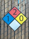 Diamond shaped NFPA panel identifying hazardous chemicals inside fenced in area. Royalty Free Stock Photo