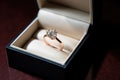 a diamond solitaire engagement ring in a box