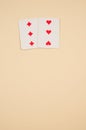 3 of diamonds and hearts poker cards on a beige background with free space for text
