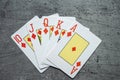 Diamonds royal flush playing cards poker combination on grey background Royalty Free Stock Photo