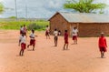 Kenya. African children in the maasai village playing soccer near the school Royalty Free Stock Photo