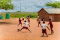 Kenya. African children in the maasai village playing soccer near the school Royalty Free Stock Photo