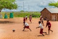 Kenya. African children in the maasai village playing soccer near the school Royalty Free Stock Photo