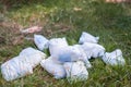 Diapers waste, dirty diapers in nature. Disposing of used baby nappies. Environmental Impact of Disposable Diapers. Pollution of