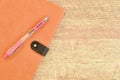 Diary book and pen on wooden table Royalty Free Stock Photo