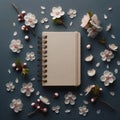 A diary lying among a mix of soft blossoms. floral background, Mockup, colorful background