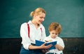 Diary. Teacher or tutor helps preschool child. How to teach a child to write. Kindergarten, preparing for school.