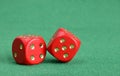 Red dice with golden points