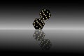 Dice.Casino banner. Black casino dice reflected on a glass background. Royalty Free Stock Photo