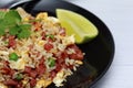 Dice Bacon Fried rice in black dish