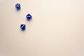 three dices blue color on light background