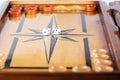 Dice and checkers on a backgammon board Royalty Free Stock Photo