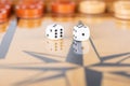 Dice and checkers on a wooden backgammon board Royalty Free Stock Photo