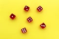 Six red dice lie on an isolated background. Royalty Free Stock Photo