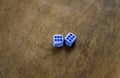 Dice cubes on a wooden table two sixes Royalty Free Stock Photo