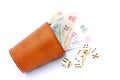 Dice cup with money Royalty Free Stock Photo