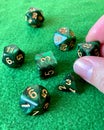 Dice game green polyhedral, MTG dice and cards. Royalty Free Stock Photo