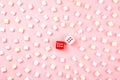 Dice with hearts and rows of marshmellow Royalty Free Stock Photo