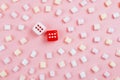 Dice with hearts and rows of marshmellow Royalty Free Stock Photo