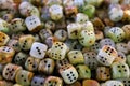 Dice made of natural stone. Background with selective focus and copy space