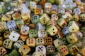 Dice made of natural stone. Background with selective focus and copy space