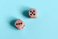 Dice with the numbers three and five on a light background. Royalty Free Stock Photo