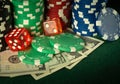 Dice and stacks of chips on money in a poker club. A successful combination brought a rich win Royalty Free Stock Photo
