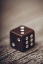 Dice on table, vintage effect. Background for casino games, gambling, luck or randomness. Rolling the dice concept for business Royalty Free Stock Photo