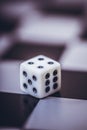 Dice on table, vintage effect. Background for casino games, gambling, luck or randomness. Rolling the dice concept for business Royalty Free Stock Photo