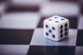 Dice on table, vintage effect. Background for casino games, gambling, luck or randomness. Rolling the dice concept for business Royalty Free Stock Photo