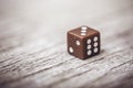 Dice on table, vintage effect. Background for casino games, gambling, luck or randomness. Rolling the dice concept for business Royalty Free Stock Photo