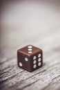 Dice on table, vintage effect. Background for casino games, gambling, luck or randomness. Rolling the dice concept for business Royalty Free Stock Photo